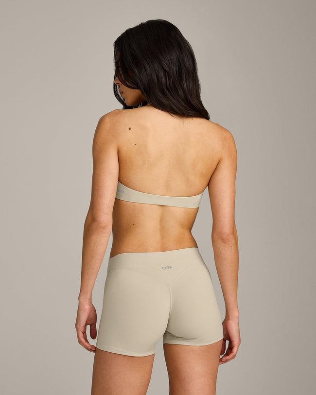 SoftMotion™ Minimal Halter Neck Bralette with Gray Logo | Oatmeal