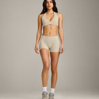 SoftMotion™ Minimal Halter Neck Bralette with Gray Logo | Oatmeal
