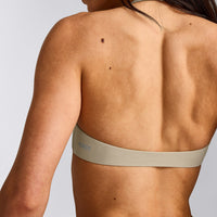 SoftMotion™ Minimal Halter Neck Bralette with Gray Logo | Oatmeal