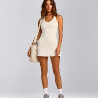 SoftMotion™ Racer Back Dress with Built in Shorts with Gray Logo | Marshmallow White