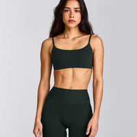 SoftMotion™ Strappy Sports Bra with Gray Logo | Emerald Noir