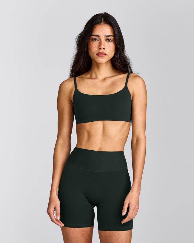 SoftMotion™ Strappy Sports Bra with Gray Logo | Emerald Noir