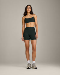 SoftMotion™ Strappy Sports Bra with Gray Logo | Emerald Noir
