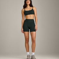 SoftMotion™ Strappy Sports Bra with Gray Logo | Emerald Noir