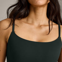 SoftMotion™ Strappy Sports Bra with Gray Logo | Emerald Noir