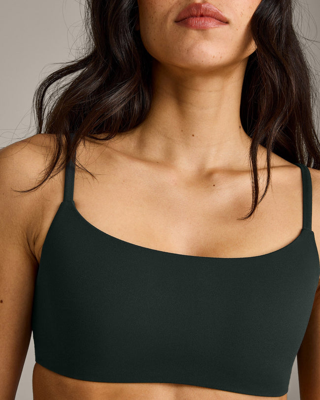 SoftMotion™ Strappy Sports Bra with Gray Logo | Emerald Noir
