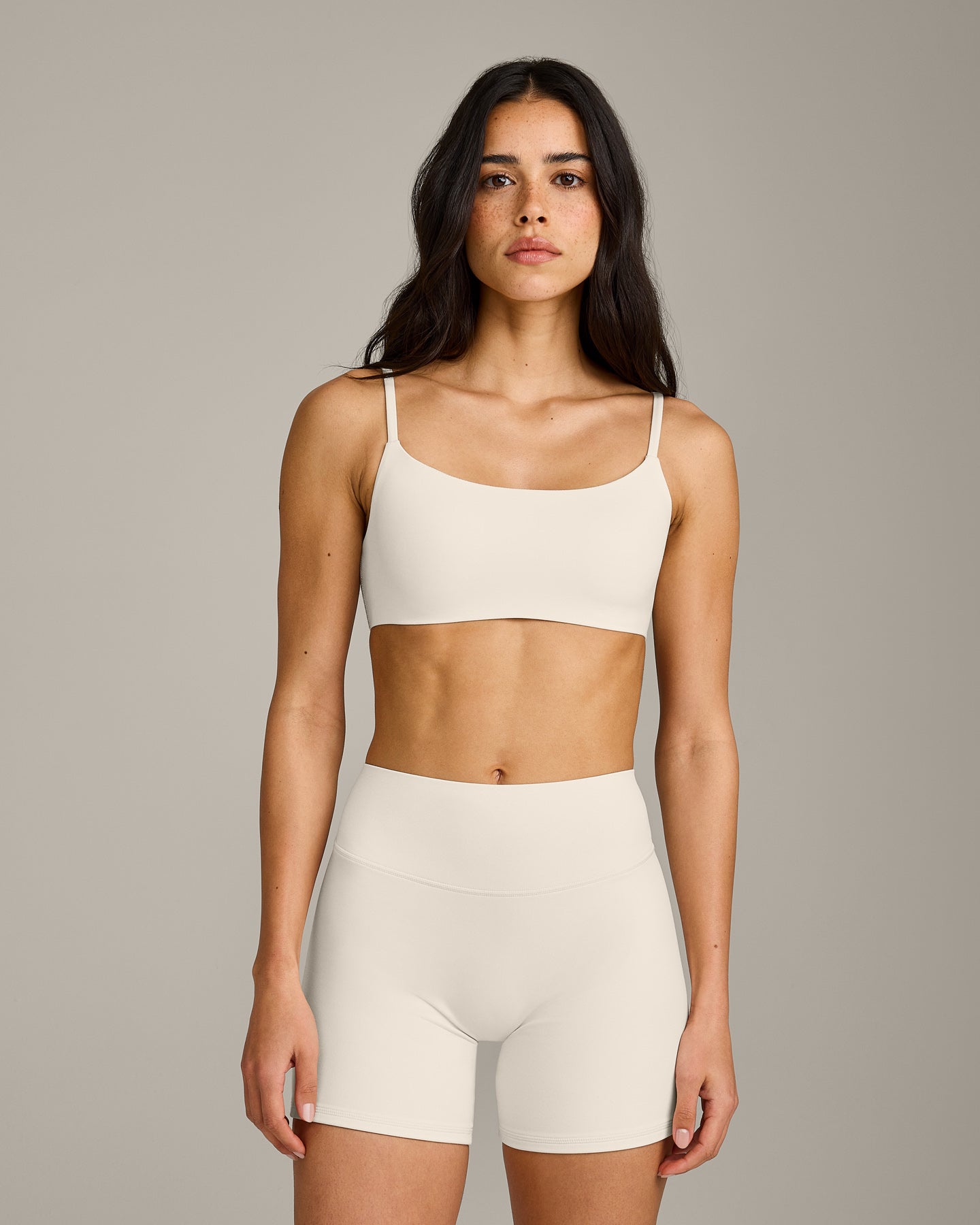 SoftMotion™ Strappy Sports Bra with Gray Logo | Marshmallow White