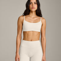 SoftMotion™ Strappy Sports Bra with Gray Logo | Marshmallow White