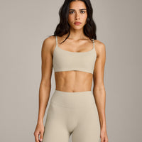SoftMotion™ Strappy Sports Bra with Gray Logo | Oatmeal