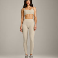 SoftMotion™ Strappy Sports Bra with Gray Logo | Oatmeal