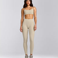 SoftMotion™ Strappy Sports Bra with Gray Logo | Oatmeal