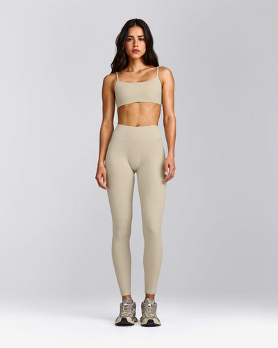 SoftMotion™ Strappy Sports Bra with Gray Logo | Oatmeal