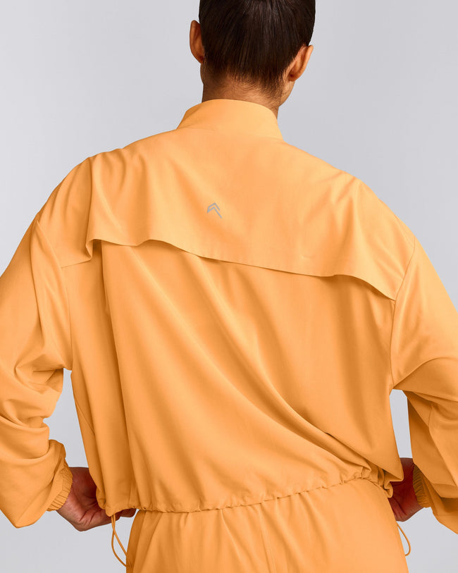 AirMove™ Jacket with Bonding with Reflective Logo | Powdered Orange