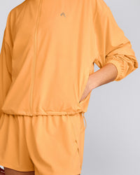 AirMove™ Jacket with Bonding with Reflective Logo | Powdered Orange