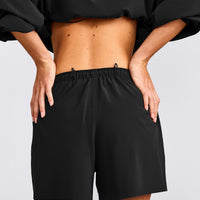 AirMove™ Lined Shorts 4" with Pocket and Reflective Logo | Black