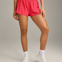 AirMove™ Lined Shorts 2" with Pocket and Reflective Logo | Charged Pink