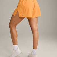 AirMove™ Lined Shorts 4" with Pocket and Reflective Logo | Powdered Orange