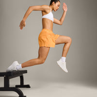 AirMove™ Lined Shorts 4" with Pocket and Reflective Logo | Powdered Orange