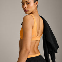 EffortlessLift™ Square Neck Sports Bra with Gray Logo | Powdered Orange