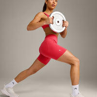 EffortlessLift™ Seamless Mid Rise Shorts with Gray Logo | Charged Pink