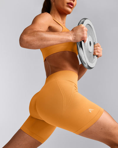 EffortlessLift™ Seamless Mid Rise Shorts with Gray Logo | Powdered Orange