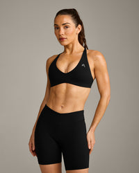 UnifiedMove™ Cross Back Sports Bra with Reflective Logo | Black