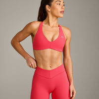 UnifiedMove™ Cross Back Sports Bra with Reflective Logo | Charged Pink