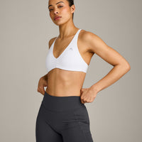 UnifiedMove™ Cross Back Sports Bra with Reflective Logo | White