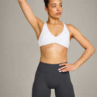 UnifiedMove™ Cross Back Sports Bra with Reflective Logo | White