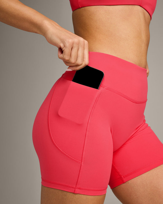 UnifiedMove™ Pocket Shorts 6" with Bonding with Reflective Logo | Charged Pink