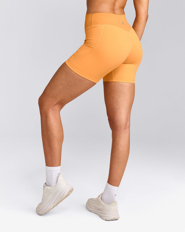 UnifiedMove™ Pocket Shorts 6" with Bonding with Reflective Logo | Powdered Orange