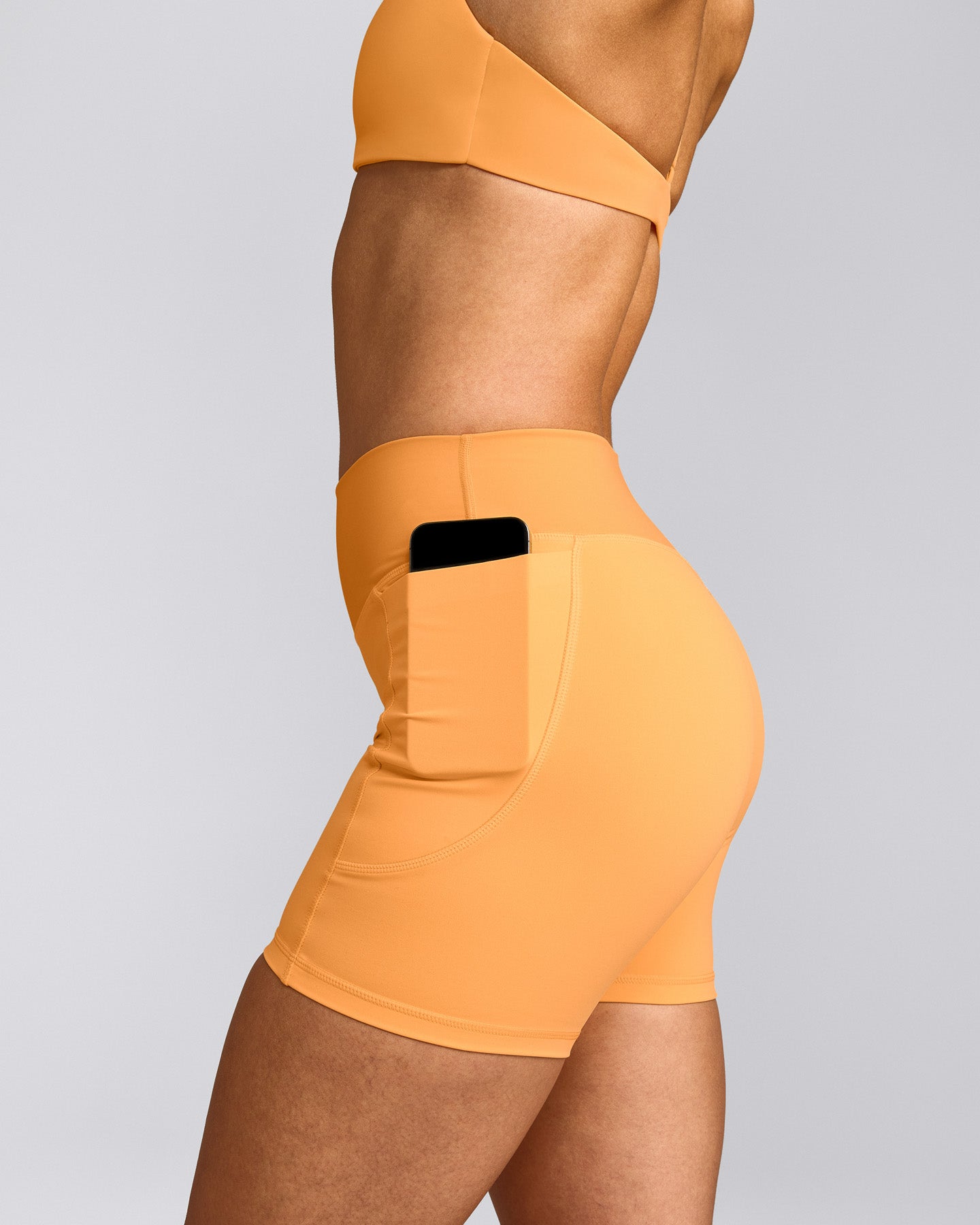 UnifiedMove™ Pocket Shorts 6" with Bonding with Reflective Logo | Powdered Orange