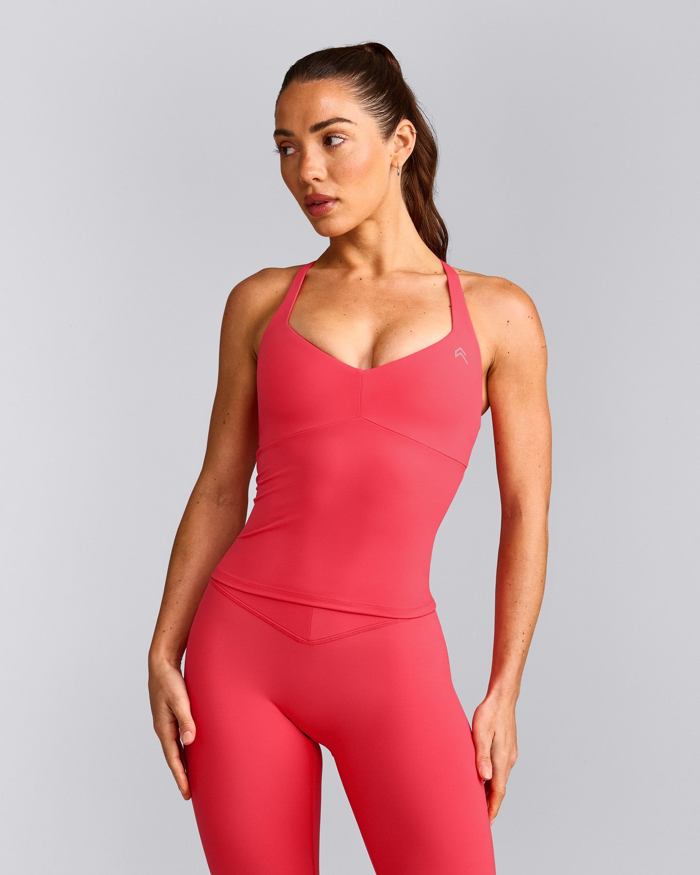 UnifiedMove™ T Back Mid Tank Top with Built in Bra Shelf with Reflective Logo | Charged Pink