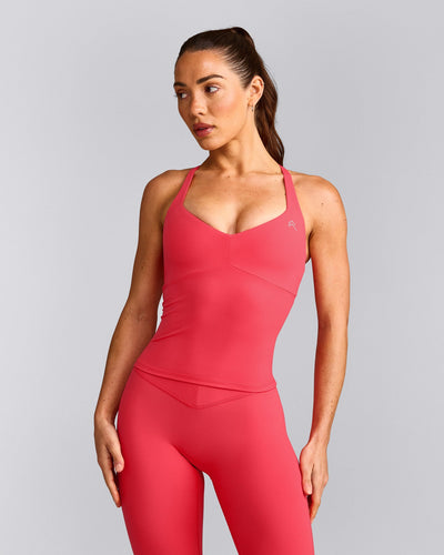 UnifiedMove™ T Back Mid Tank Top with Built in Bra Shelf with Reflective Logo | Charged Pink
