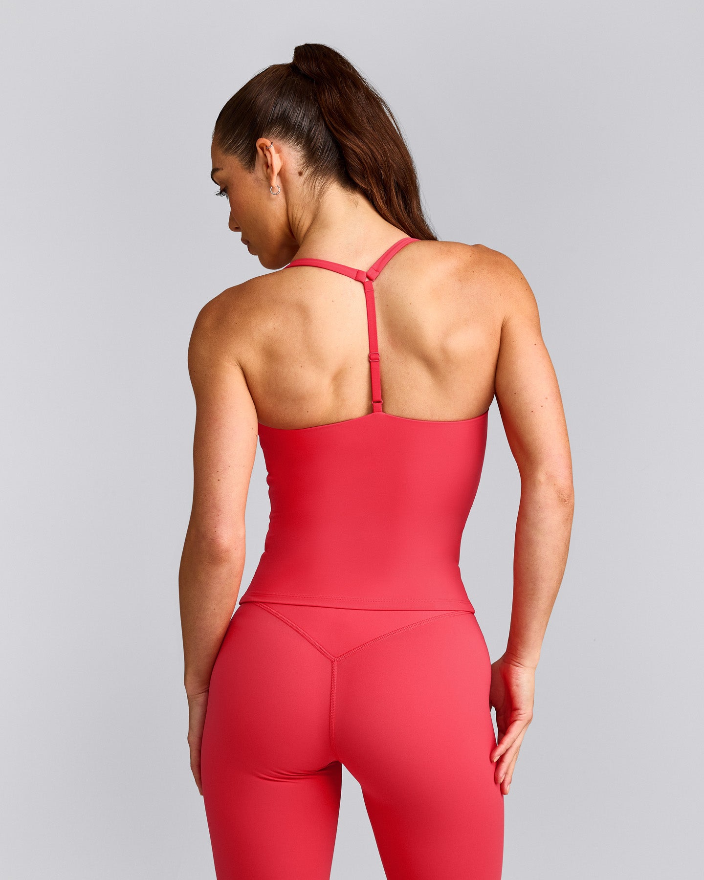 UnifiedMove™ T Back Mid Tank Top with Built in Bra Shelf with Reflective Logo | Charged Pink