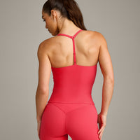 UnifiedMove™ T Back Mid Tank Top with Built in Bra Shelf with Reflective Logo | Charged Pink