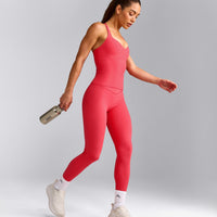 UnifiedMove™ T Back Mid Tank Top with Built in Bra Shelf with Reflective Logo | Charged Pink