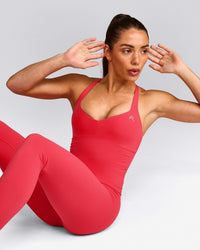 UnifiedMove™ T Back Mid Tank Top with Built in Bra Shelf with Reflective Logo | Charged Pink