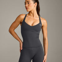 UnifiedMove™ T Back Mid Tank Top with Built in Bra Shelf with Reflective Logo | Coal