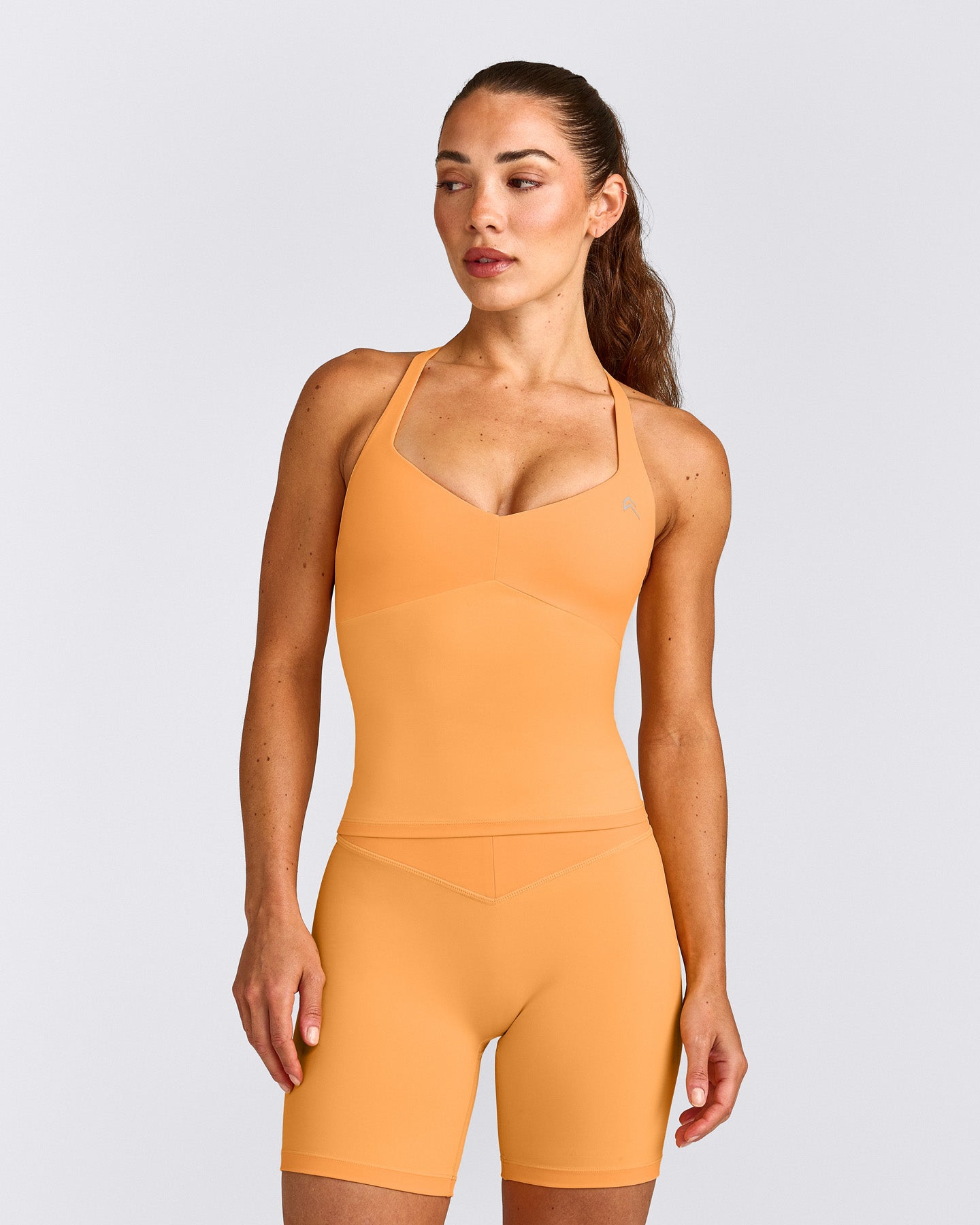 UnifiedMove™ T Back Mid Tank Top with Built in Bra Shelf with Reflective Logo | Powdered Orange