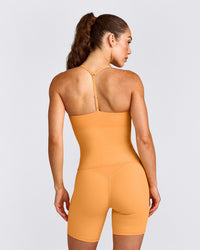 UnifiedMove™ T Back Mid Tank Top with Built in Bra Shelf with Reflective Logo | Powdered Orange