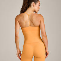 UnifiedMove™ T Back Mid Tank Top with Built in Bra Shelf with Reflective Logo | Powdered Orange