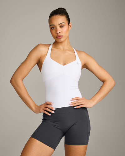 UnifiedMove™ T Back Mid Tank Top with Built in Bra Shelf with Reflective Logo | White