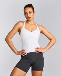 UnifiedMove™ T Back Mid Tank Top with Built in Bra Shelf with Reflective Logo | White