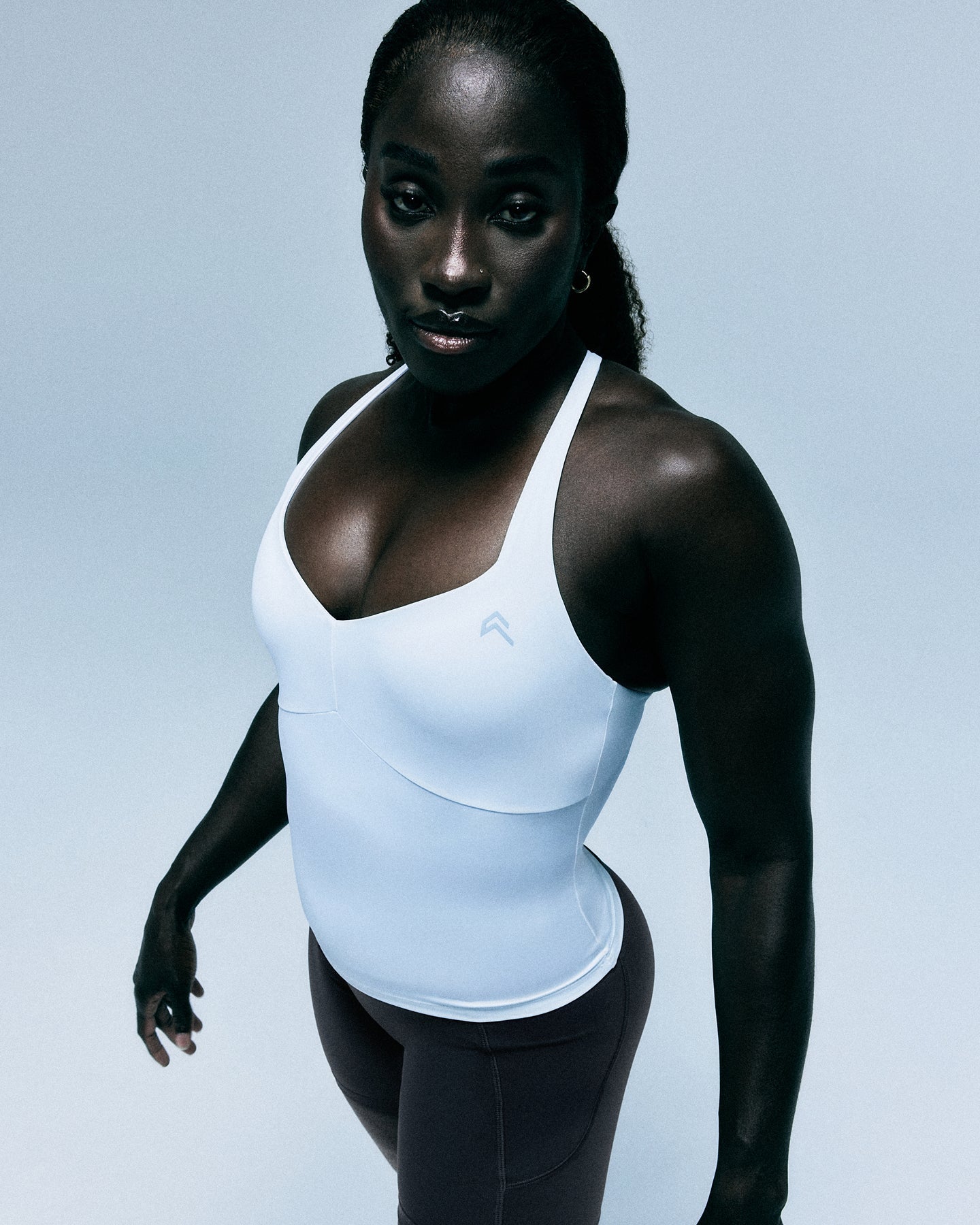 UnifiedMove™ T Back Mid Tank Top with Built in Bra Shelf with Reflective Logo | White