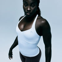 UnifiedMove™ T Back Mid Tank Top with Built in Bra Shelf with Reflective Logo | White