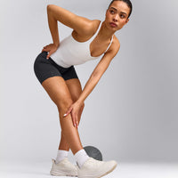 UnifiedMove™ T Back Mid Tank Top with Built in Bra Shelf with Reflective Logo | White
