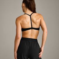 UnifiedMove™ T Back Minimal Bralette with Reflective Logo | Black