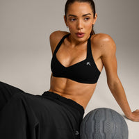 UnifiedMove™ T Back Minimal Bralette with Reflective Logo | Black