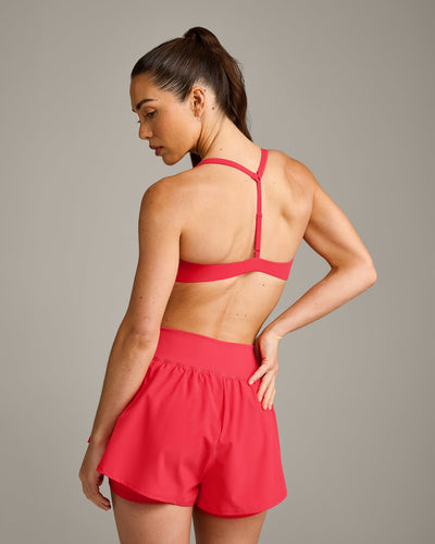 UnifiedMove™ T Back Minimal Bralette with Reflective Logo | Charged Pink